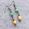 Orange Freshwater Pearl and Green Glass Bronze Tassel Necklace and Earrings Set - Image 4
