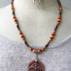 Orange Pearl and Copper Arrow Necklace and Earrings Set - Image 6