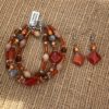 Orange Glass Triple Strand Bracelet & Earrings Set