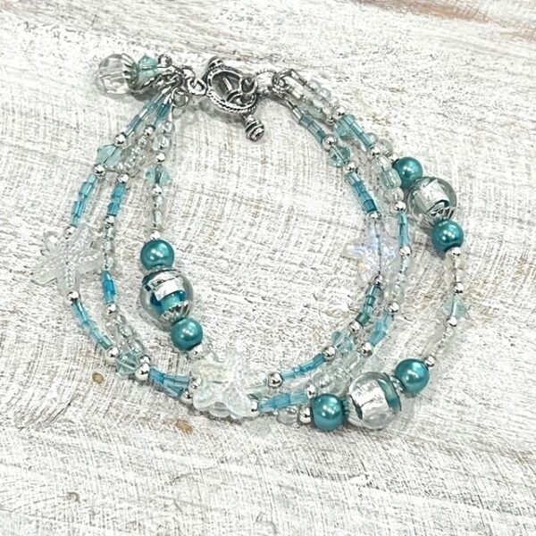 Light Blue and Clear Starfish Multi-Strand Bracelet & Earrings Set