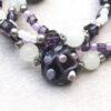 Purple Lampworked Glass and Quartz Quadruple Strand Bracelet - Image 2