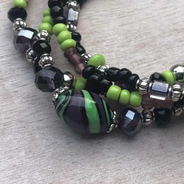 Purple, Green & Black Quadruple Strand Bracelet - Image 3