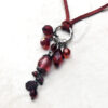 Red Faux Suede Lariat Necklace with Ring and Red Dangles - Image 2