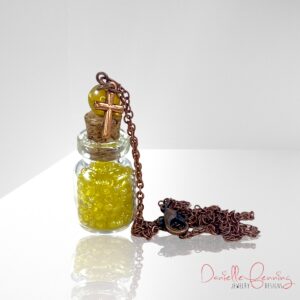 Yellow and Copper Cross Bottle Necklace