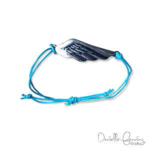 Silver Tone Wing and Teal Cord Bracelet