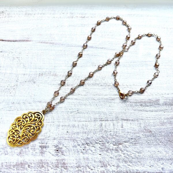 Gold Filigree Pendant on Gold Glass Faceted Chain