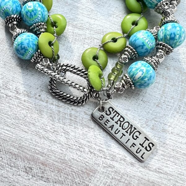 Green and Teal Clay "Strong is Beautiful" Triple Strand Bracelet and Earrings Set