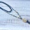 Cream Fossil & Wood Pewter Double Tassel Necklace