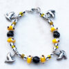 Black, Yellow and White Sparrow Charm Bracelet and Earrings Set - Image 2