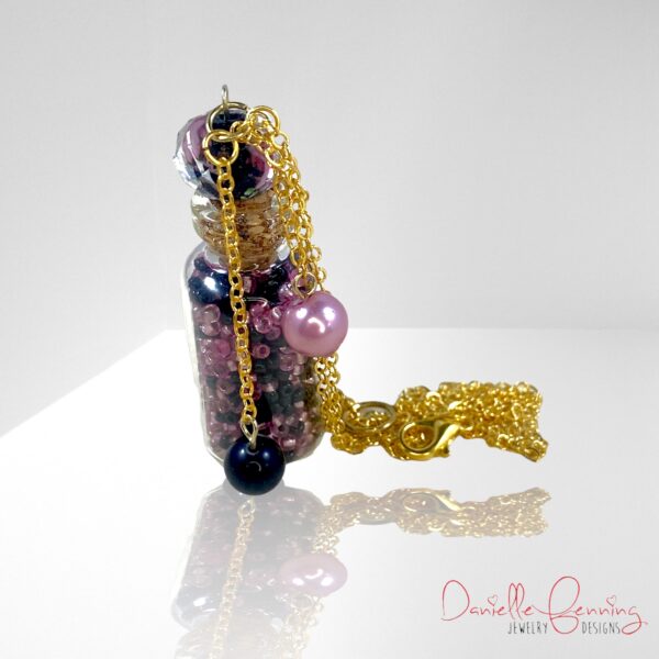 Pink and Black Floral Handblown Glass Gold Chain Bottle Necklace