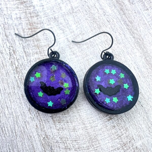 Purple Bat and Yellow Stars Black Resin Earrings